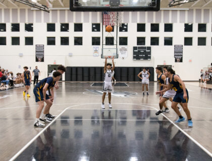 Falcons Fall Short in Winter Showdown between Neighborhood Rivals